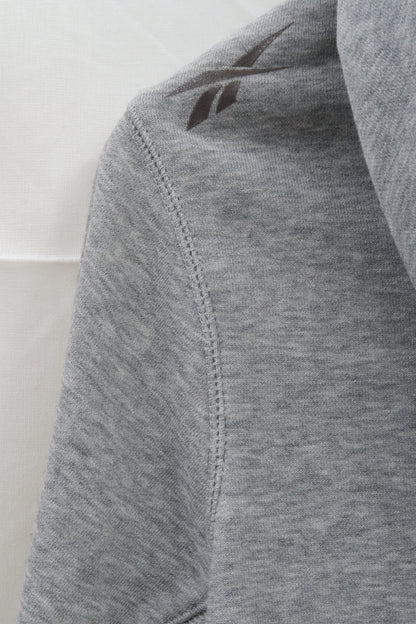 Gilet à capuche gris avec une fermeture asymétrique - Reebok - M